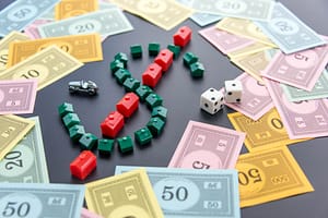 Monopoly dice and cards surrounding a dollar sign made with plastic pieces